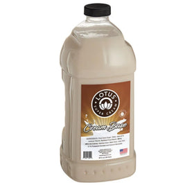Lotus Plant Power Energy Concentrate being poured into a glass for a floral energy lift.