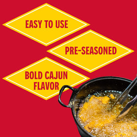 Louisiana Fish Fry Cajun Fry crispy coating image highlights crunch on fried seafood.
