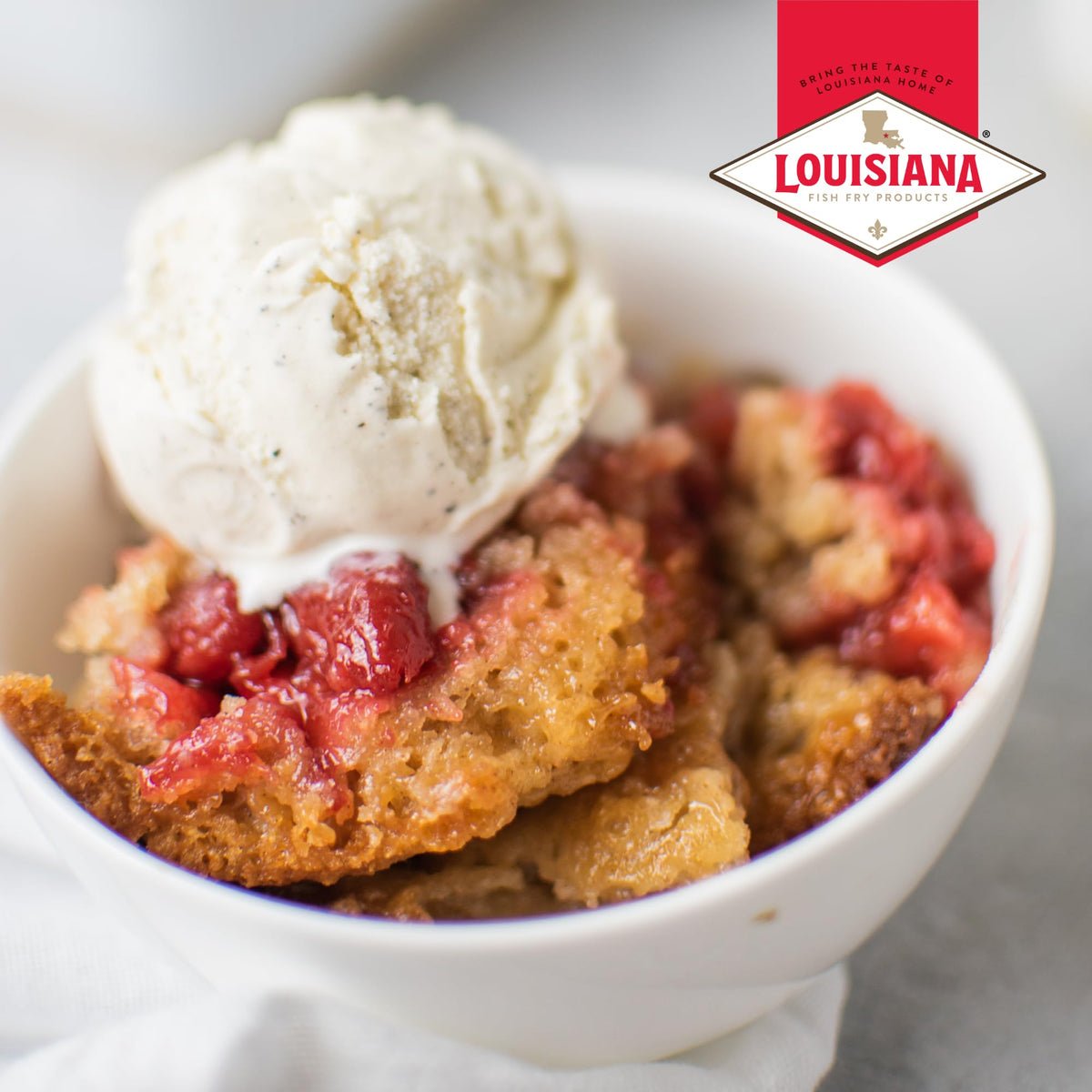 Louisiana Fish Fry Cobbler Mix family dinner setup with cobbler