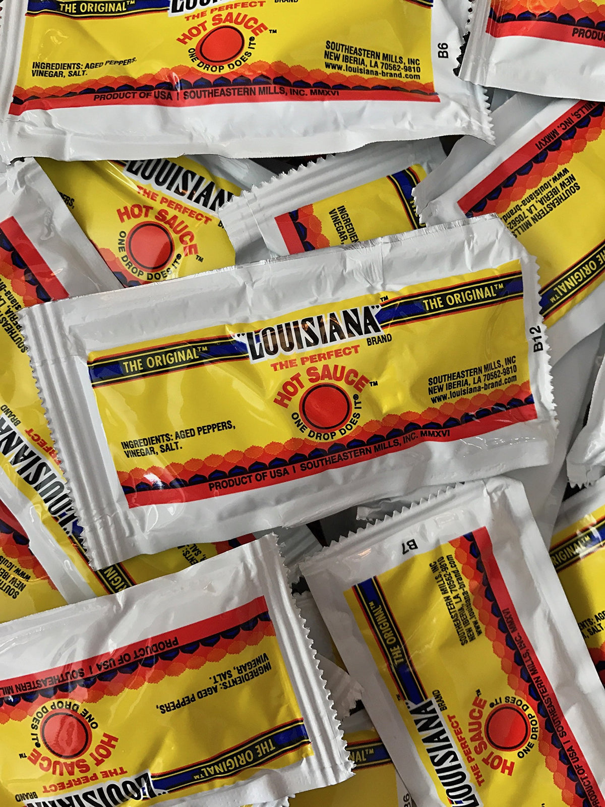 Louisiana Fish Fry original hot sauce packets for on-the-go flavor boosts.