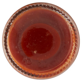 Louisiana Hot Sauce bottles on shelf evoke everyday cooking possibilities