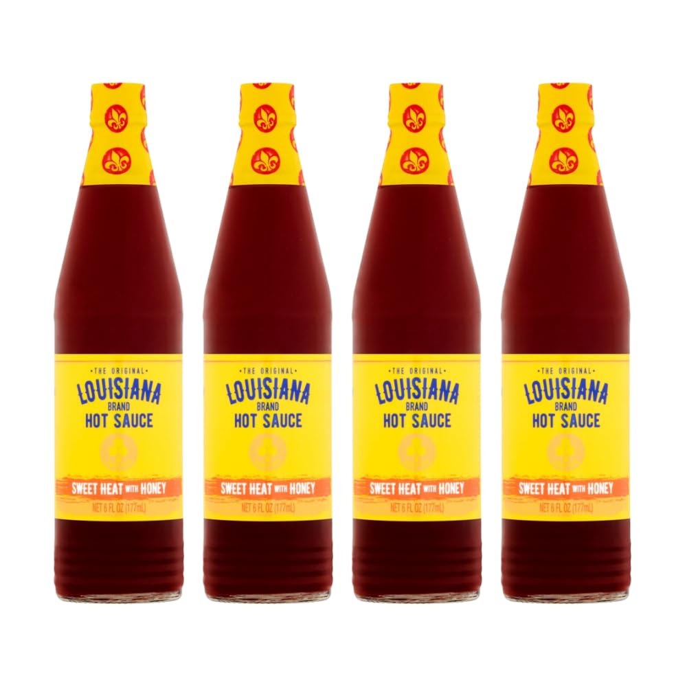Louisiana Sweet Heat Honey Hot Sauce pack of four bottles ready for meals.