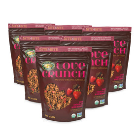 Close-up of Love Crunch granola clusters with real berries and chocolate.