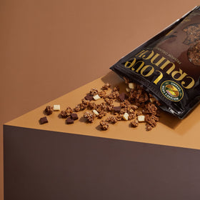 Love Crunch Double Chocolate Chunk Granola pouch 4 with clusters and chocolate for an energizing morning.