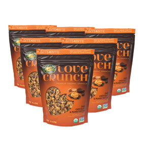 Close-up of chocolate chunks and roasted peanuts in Love Crunch granola for indulgent crunch.