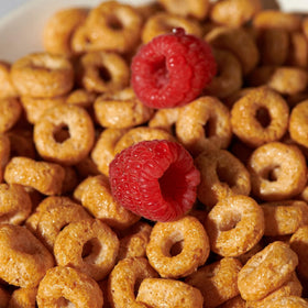 Lovebird Organic Cereal adults enjoying a quick, unsweetened breakfast or snack.