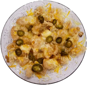 Lowrey's Bacon Curls nutrition panel emphasizes protein and fat per serving.