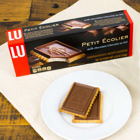 Square biscuit with Le Petite Ecolier motif, a historic touch in present-day snacks.