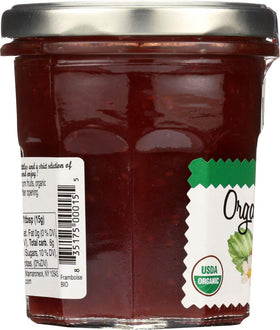 LUCIEN GEORGELIN raspberry spread pour bottle highlighting rich berry flavor.