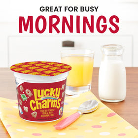 Lucky Charms cereal cup pouring milk demonstrates quick serving routine.