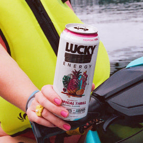 Lucky Energy Tropical Thrill pours into glass inviting smooth energy