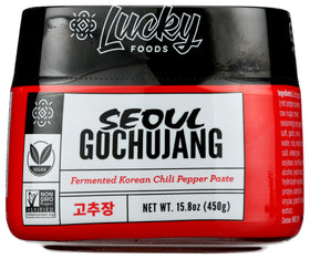 Lucky Foods Seoul Gochujang bottle pour showing rich glaze for bold stir-fry flavor