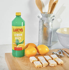 Close-up of Lucys Lemon Juice cap showing reseal for freshness.