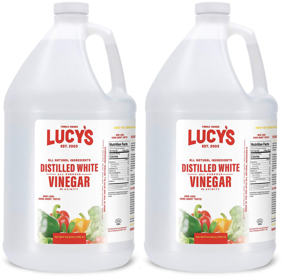 Lucy’s Natural Distilled White Vinegar bottle, a versatile kitchen staple for food prep and cleaning.