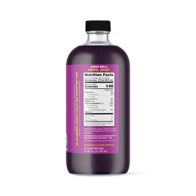 Lucy’s prune juice bottle closeup label highlights organic, non-GMO quality for everyday sipping.