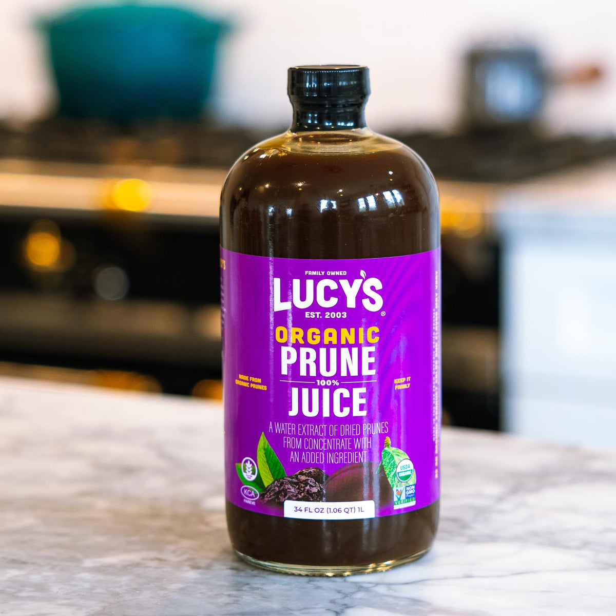 Lucy’s small-batch production scene emphasizes careful selection of organic prunes for flavor.