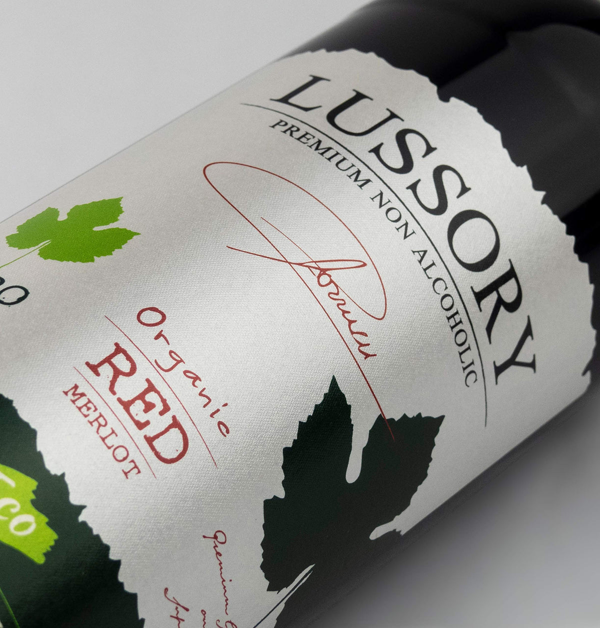 Lussory Organic Merlot Dealcoholized bottle label showing organic Merlot and 0.0% ABV.