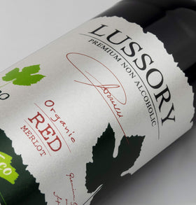 Lussory Organic Merlot Dealcoholized bottle label showing organic Merlot and 0.0% ABV.