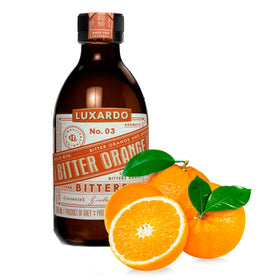 Luxardo Aromatic Infused Bitter Orange being poured into a glass for brightness