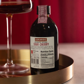 Luxardo Aromatic Infused Bitters 200ml packaging on a bar counter.