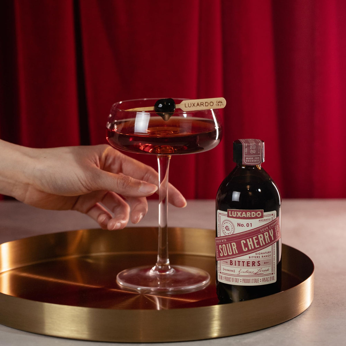 Luxardo Aromatic Infused Bitters in a kitchen setup for recipe testing.