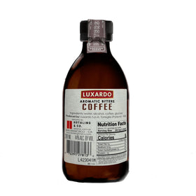 Close-up of coffee infusion notes in Luxardo bitters for rich flavor.