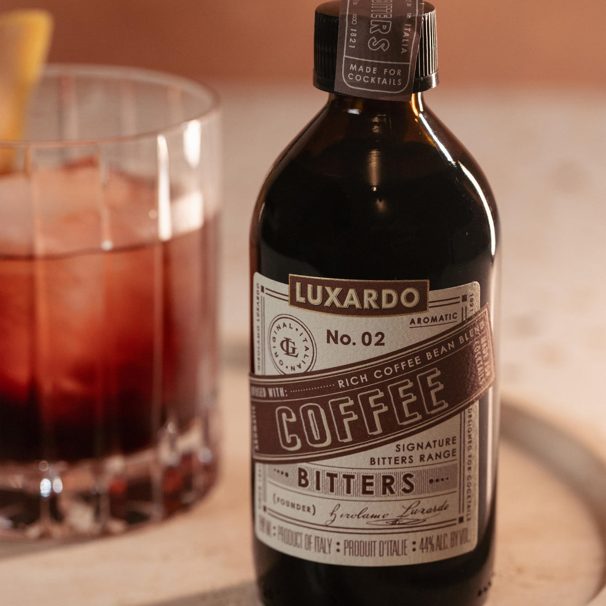 Home bar setup featuring Luxardo bitters and ingredients.