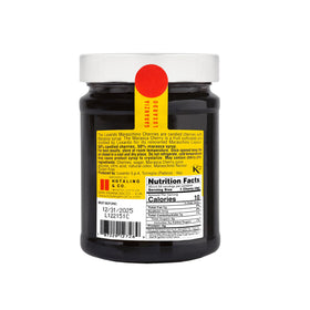 Luxardo Gourmet Cherries closeup syrup highlights rich, candied flavor for drinks.