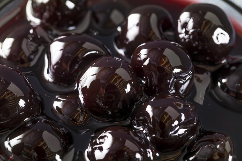 Luxardo cherries on a dessert plate elevate tarts and cakes with vibrant color.