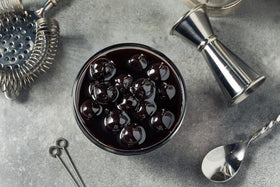 Luxardo maraschino cherries Italian import label visible on packaging.