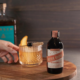 Luxardo Negroni glass with cherries demonstrates premium pairing inspiration.