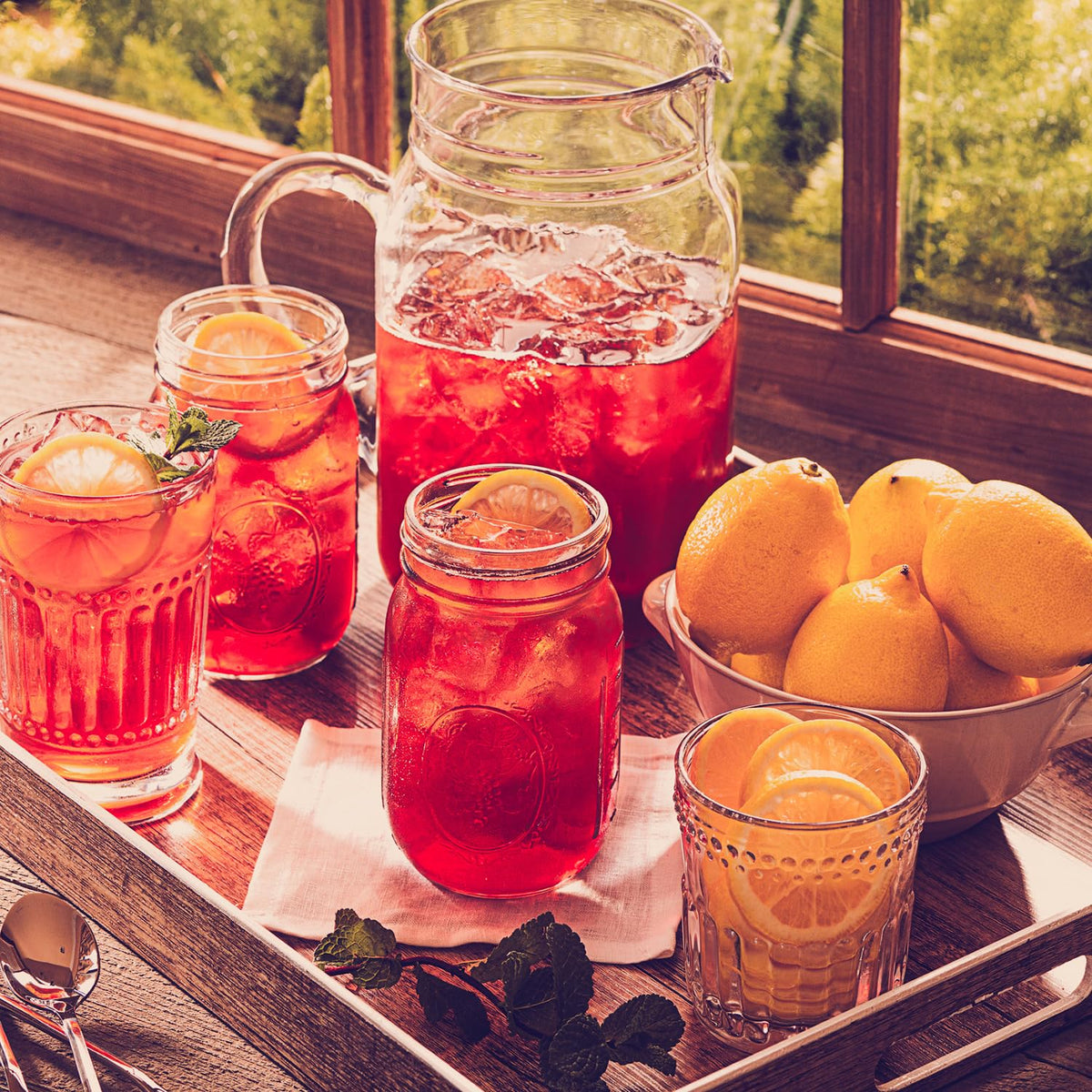 Luzianne decaf iced tea is poured into a glass for cooling.