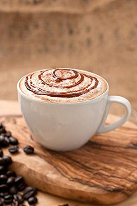 Lyons Cinnamon Designer Dessert Sauce with interchangeable tip for precise drizzle options.