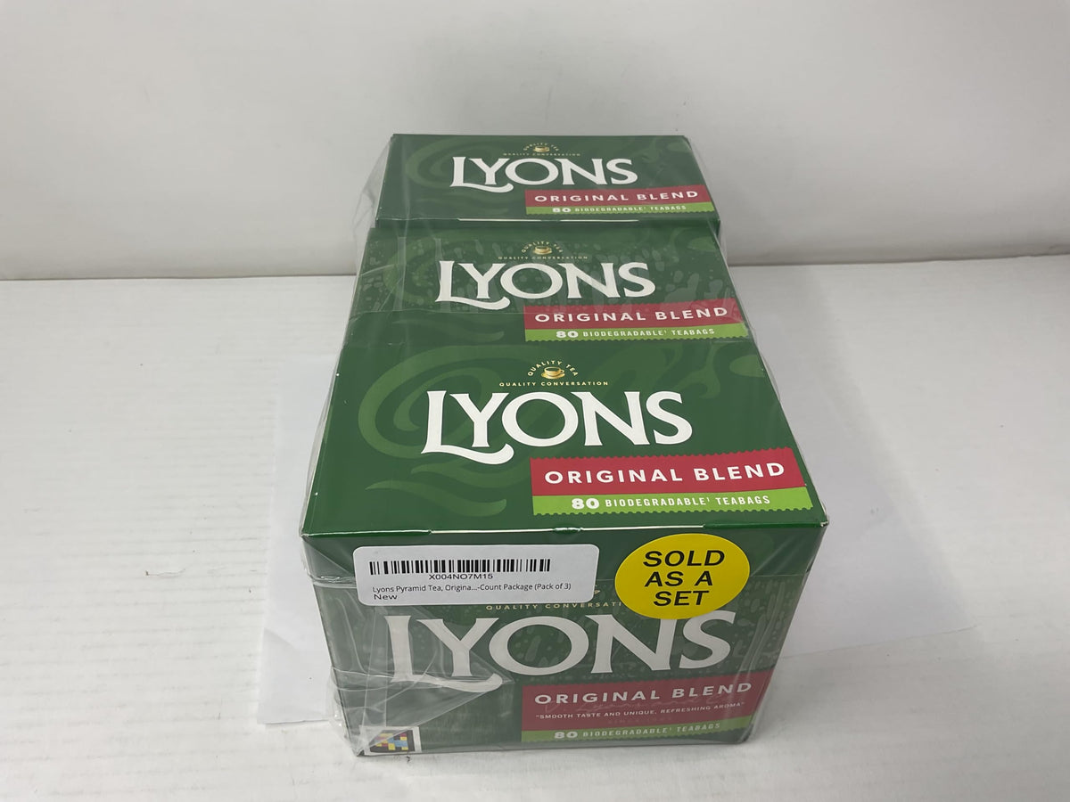 A brewed cup of Lyons Original Blend with steam rising, inviting a cozy moment.