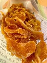 Close-up of Nutty & Fruity Tangerine Wedges highlighting natural sweetness and bright flavor.