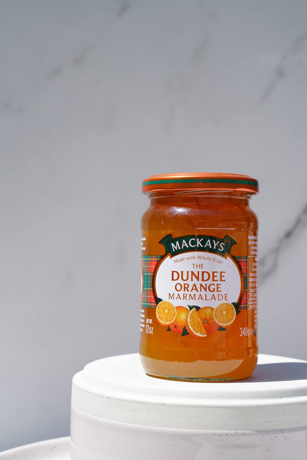 Mackays traditional copper pans capturing authentic homemade marmalade texture.