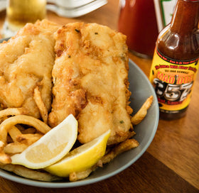 Mad Dog Gear Mad Dog 357 hot sauce on pizza delivers bold heat and tang.