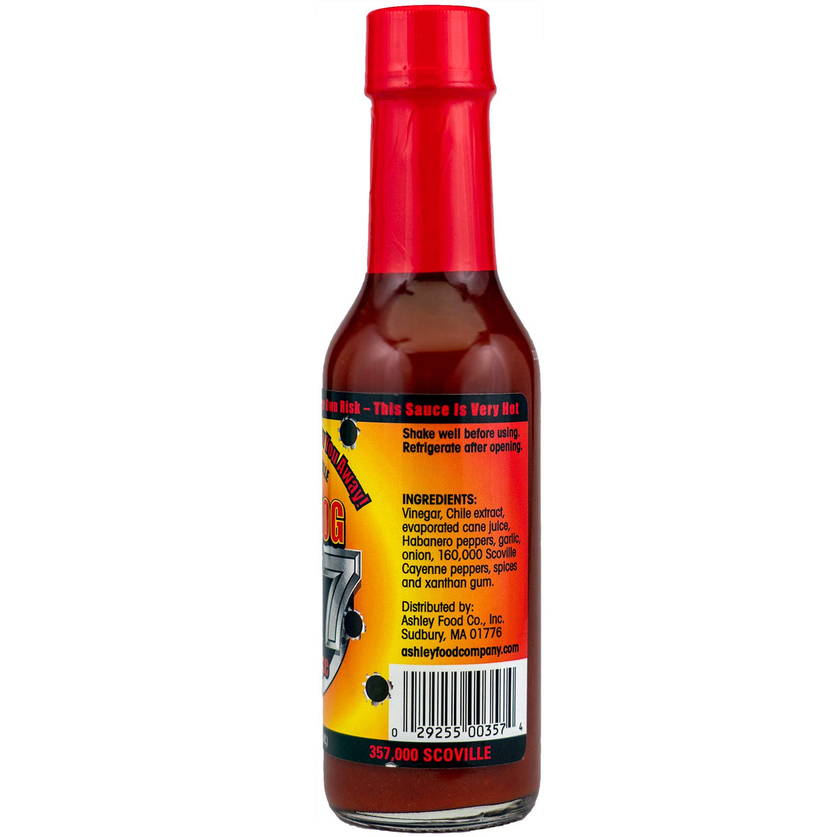 Mad Dog Gear Mad Dog 357 hot sauce pour demonstrates a fiery kick for meals.