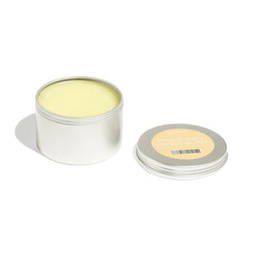 Made In carbon steel seasoning wax container close-up highlighting even polymerization.