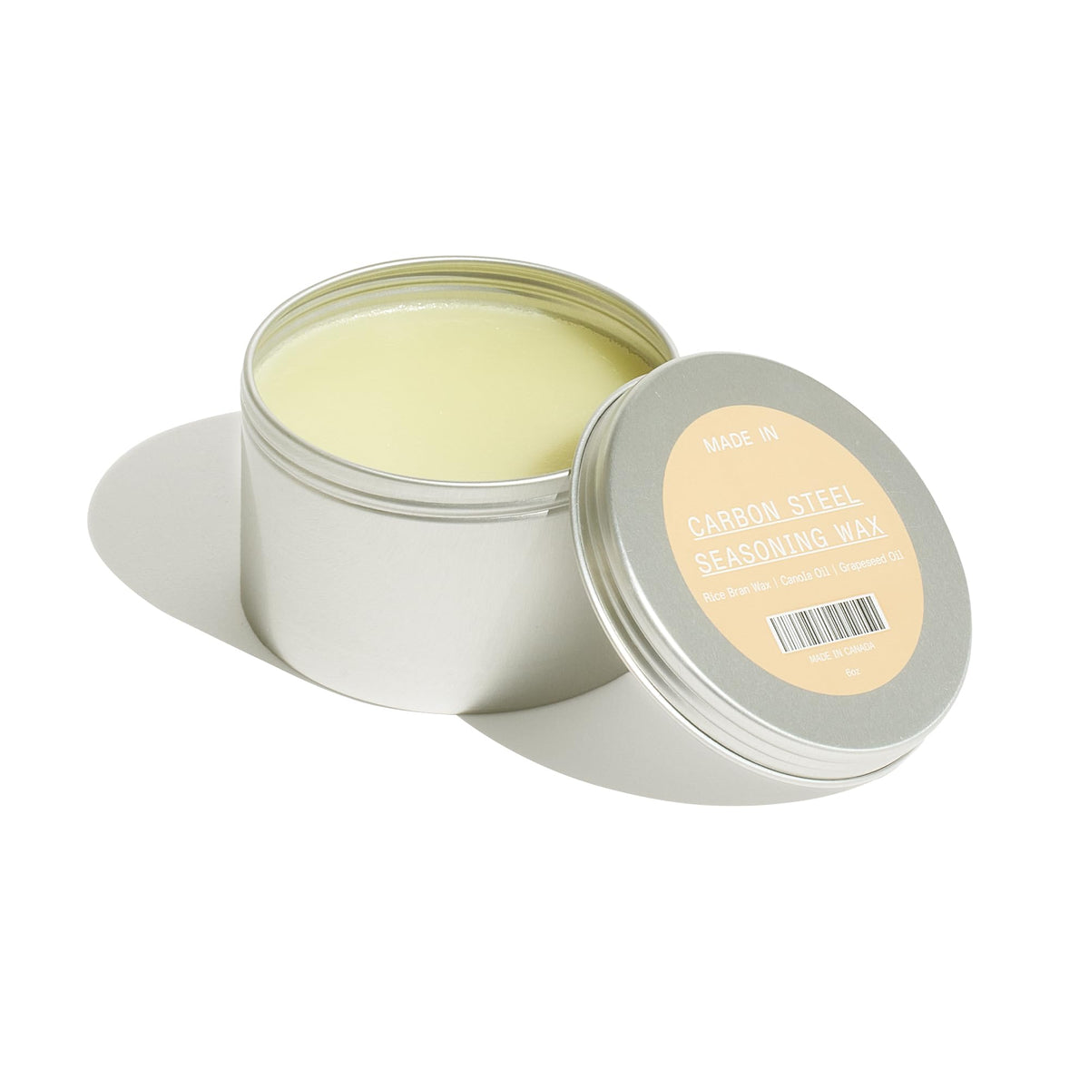 Made In carbon steel seasoning wax packaging, 6 oz can for easy upkeep and rust prevention.