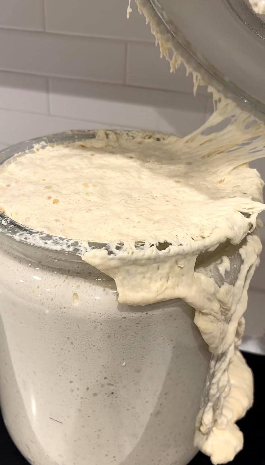 Made With Loave dough mixing captures hands-on activation for fresh bread.