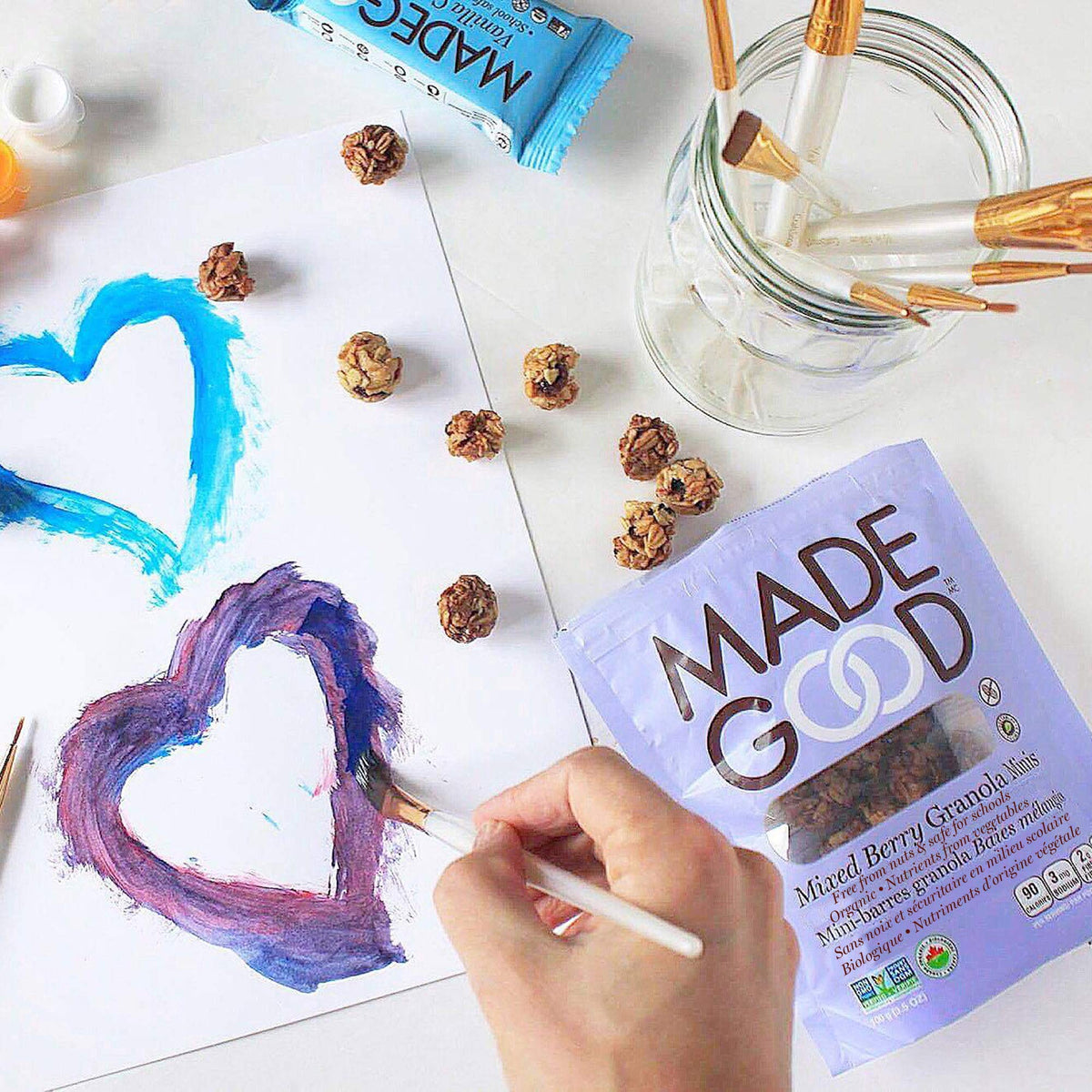 Taste moment with MadeGood Granola Minis showing crunchy berry clusters