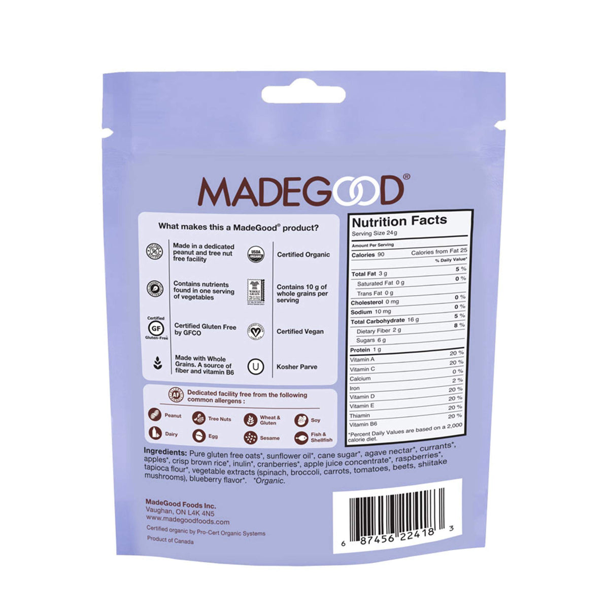 Close up of MadeGood Mixed Berry Granola Minis showing ingredients and texture