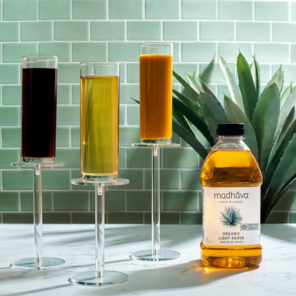 Madhava Organic Light Agave bottle label highlights organic purity for healthy kitchens.
