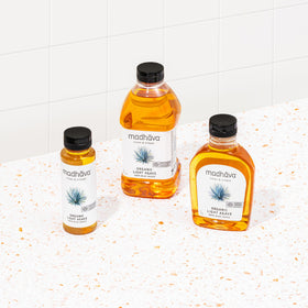 Madhava Organic Light Agave bottle side-view demonstrates versatile use in recipes.