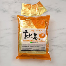 Brewing instructions panel on MAEDA-EN Genmai-cha packaging for easy prep.