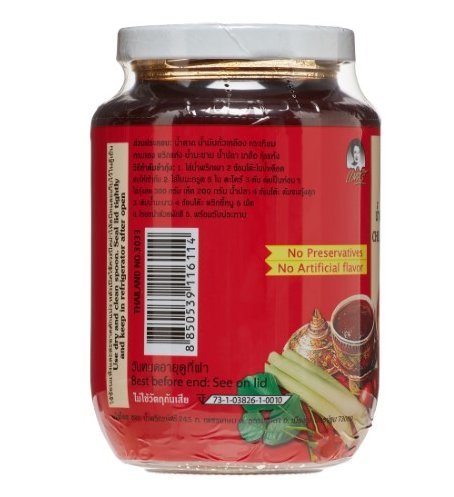 Maesri Nam Prik Pao ingredients bowl with peppers and garlic for a versatile base.