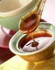 Maggie Gin's Sweet & Sour Sauce bottle highlights no MSG.