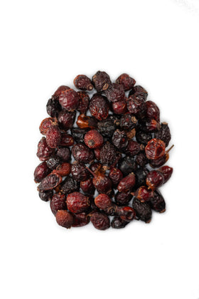 Close-up of MagJo Naturals rosehips shows vibrant red berries and natural texture