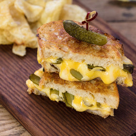 Maille Cornichons Original on a charcuterie board for vibrant flavor.